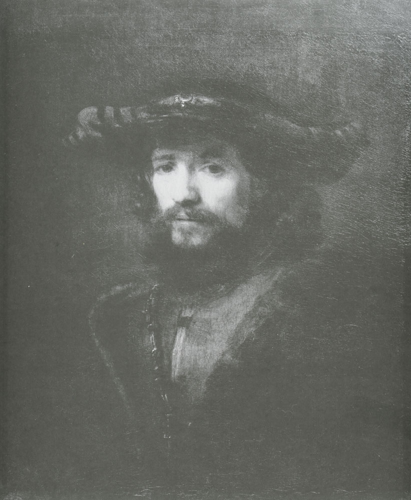 Bust of man wearing a large-brimmed hat